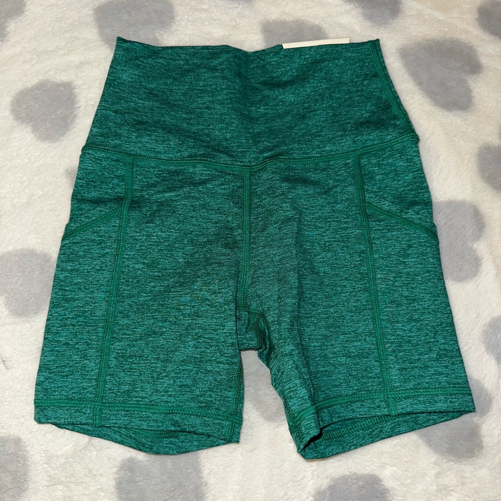 Green biker shorts